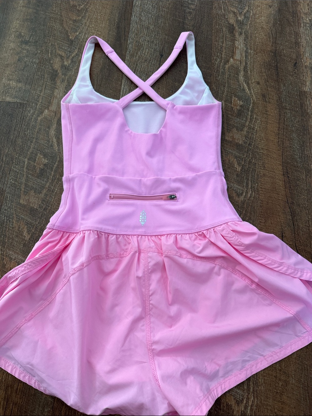 FP movement, free people, pink athletic romper Cross back built-in shorts